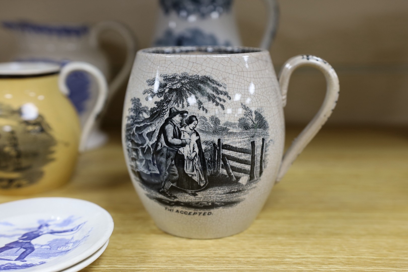 A group of mid 19th century Staffordshire British rifle volunteers and rifle target practice commemorative ceramics